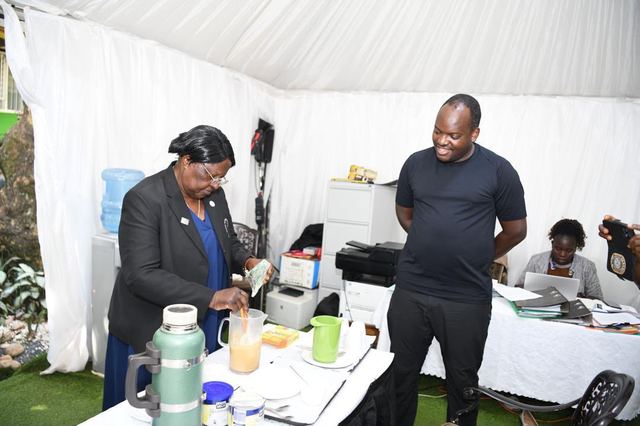 A coffee preparation activity at an outdoor event tent